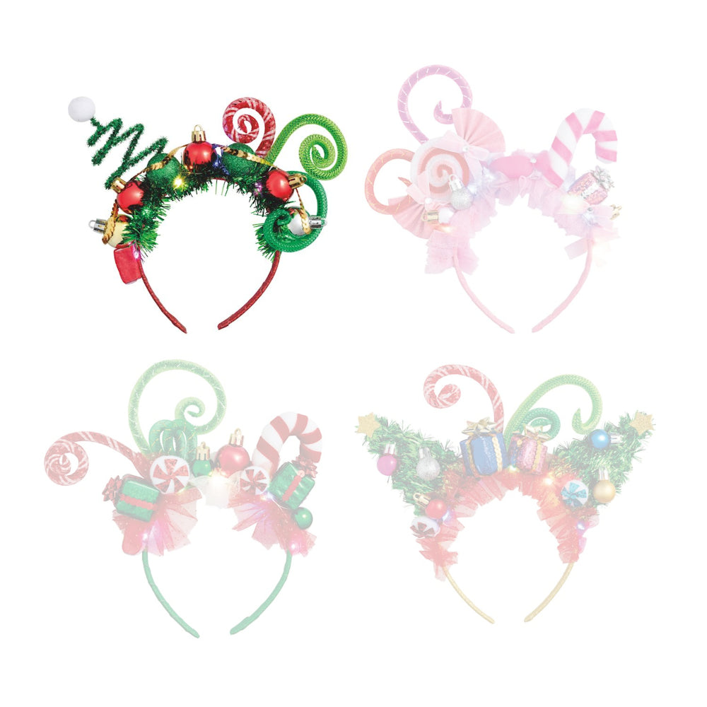 Red festive headband with candy cane designs and christmas ornaments on a white background.