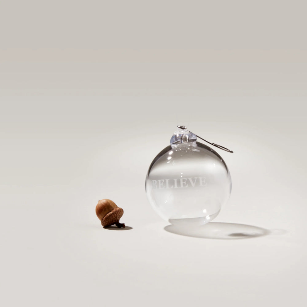 Simon Pearce Engraved "Believe" Round Ornament in Gift Box