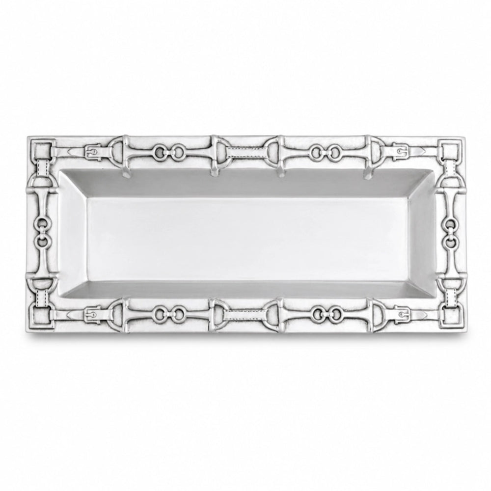 A rectangular silver serving tray with an ornate decorative border featuring repeating horsebit motifs, shown on a plain white background.