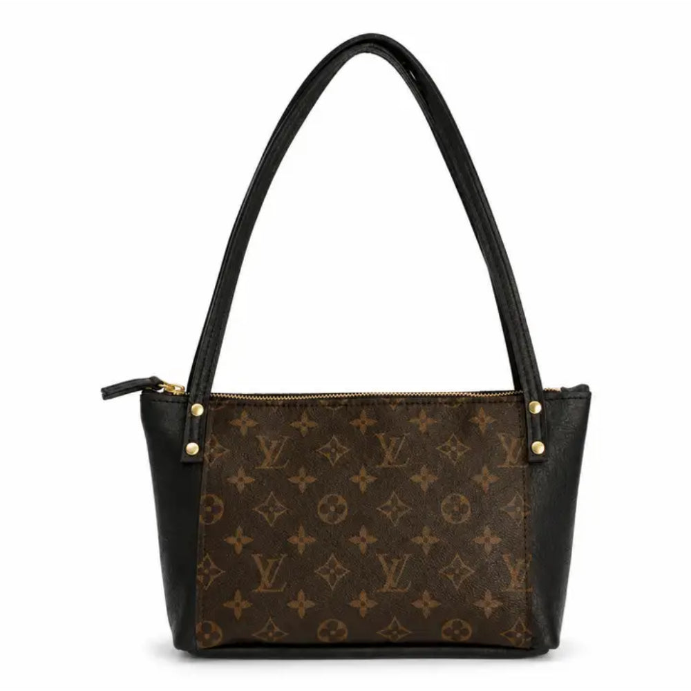 Louis Vuitton shoulder bag in brown monogram canvas with black leather trim and handles, featuring gold-tone hardware on a white background.