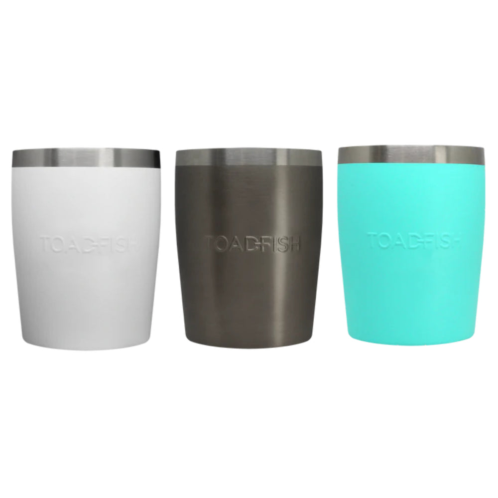 Three insulated tumbers in white,graphite and teal with 'Toadfish' branding on a white background.
