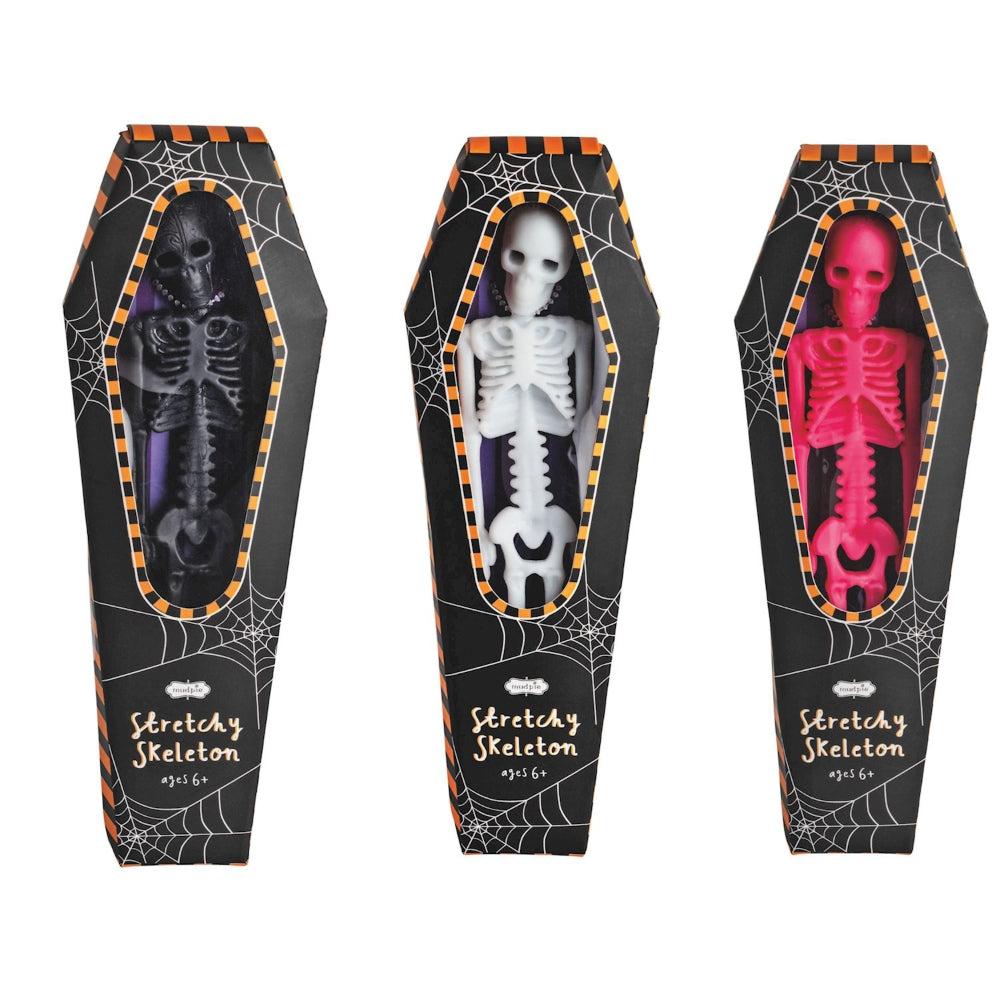 Three stretchy skeleton toys in black coffins with orange trim on a white background.