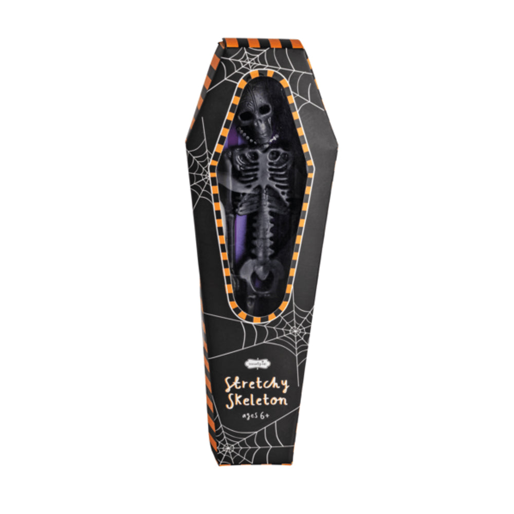 Halloween-themed coffin with a stretchy skeleton toy inside on a white background