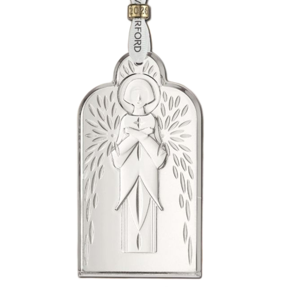 Clear crystal christmas ornament with hanger and a religious design on a white background.