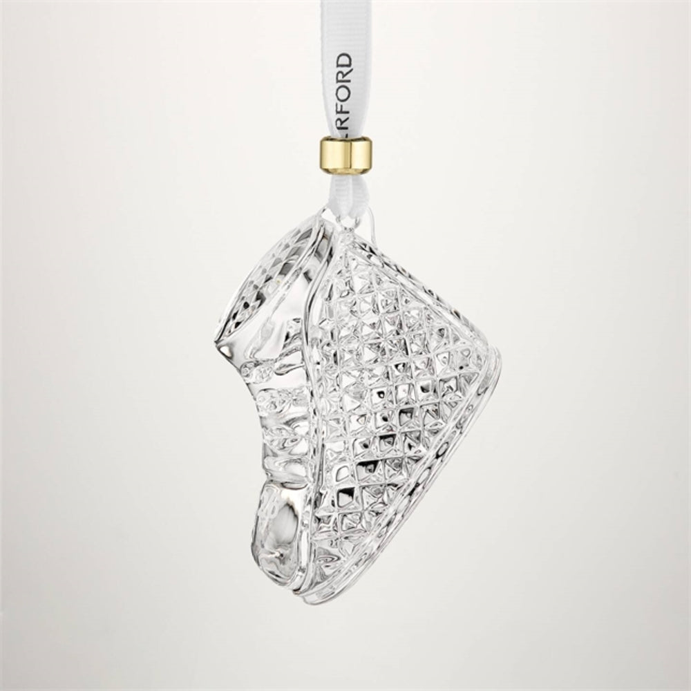 A clear textured glass ornament shaped like a sneaker, hanging from a white ribbon with a gold loop and the brand name 'RIFORD' printed on it, set against a light gray background.