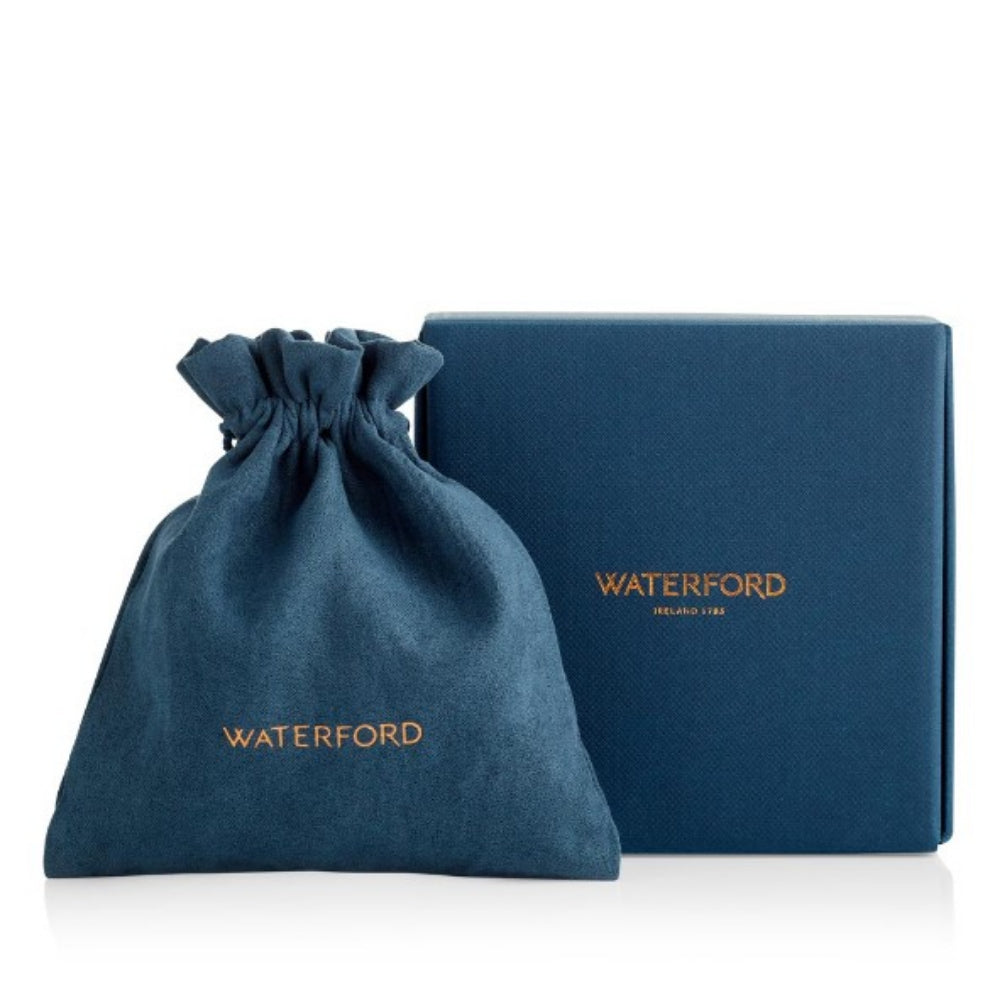 Blue drawstring bag and box with 'Waterford' branding on a white background
