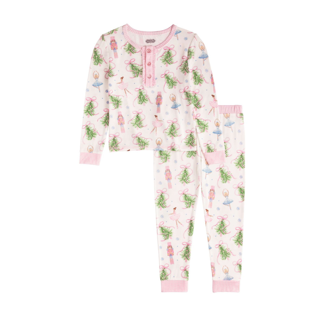 Children's christmas tree pajama set with a pink and green trees, nutcrackers and ballarina on a white background.