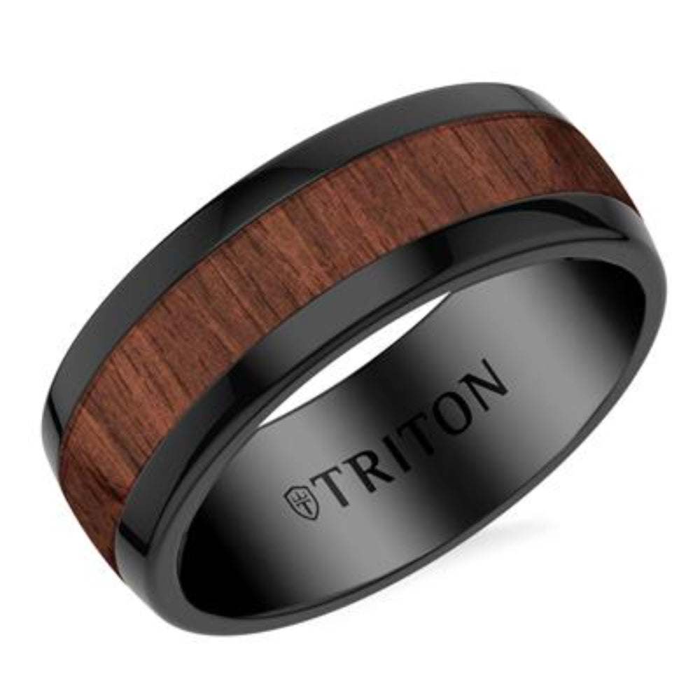 A black ceramic ring with a polished reddish-brown wood inlay, featuring the brand name 'TRITON' engraved inside the band, shown on a clean white background.