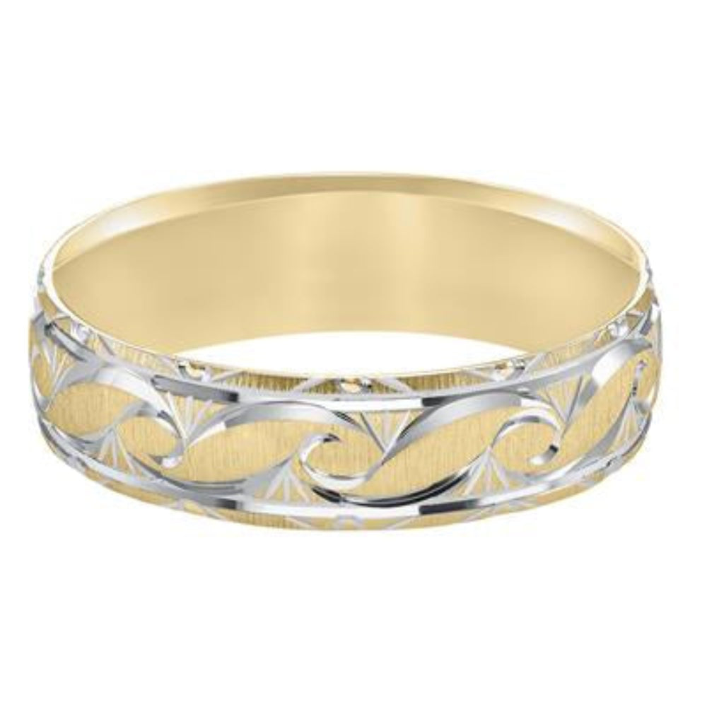 Gold and silver ring with intricate design on a white background