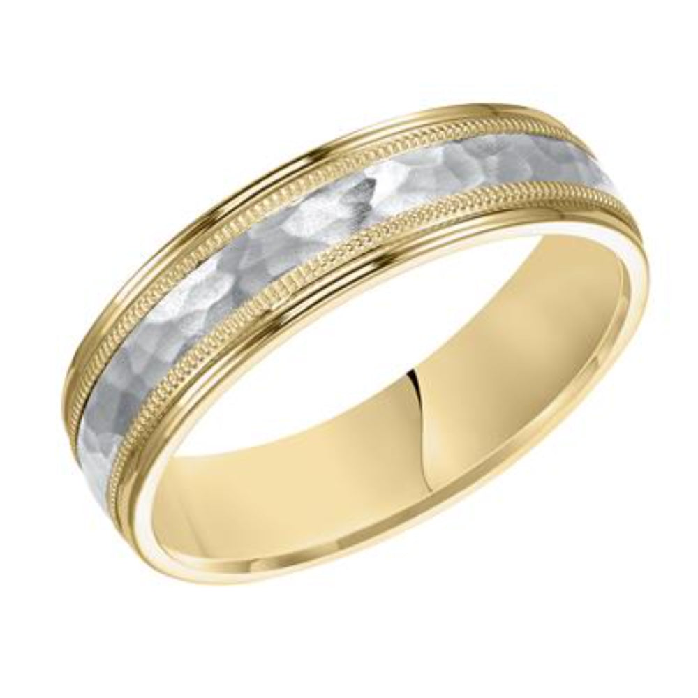 Gold ring with a textured white interior on a white background