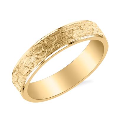 gold ring with engraving on a slant on a white background