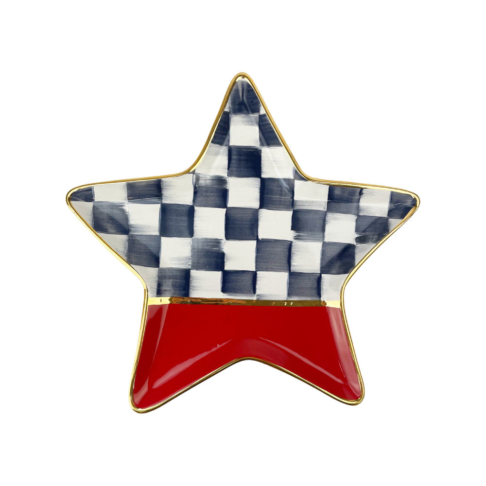 MacKenzie Childs ceramic red, black and white checkered star shaped dish with a gold trim on a white background