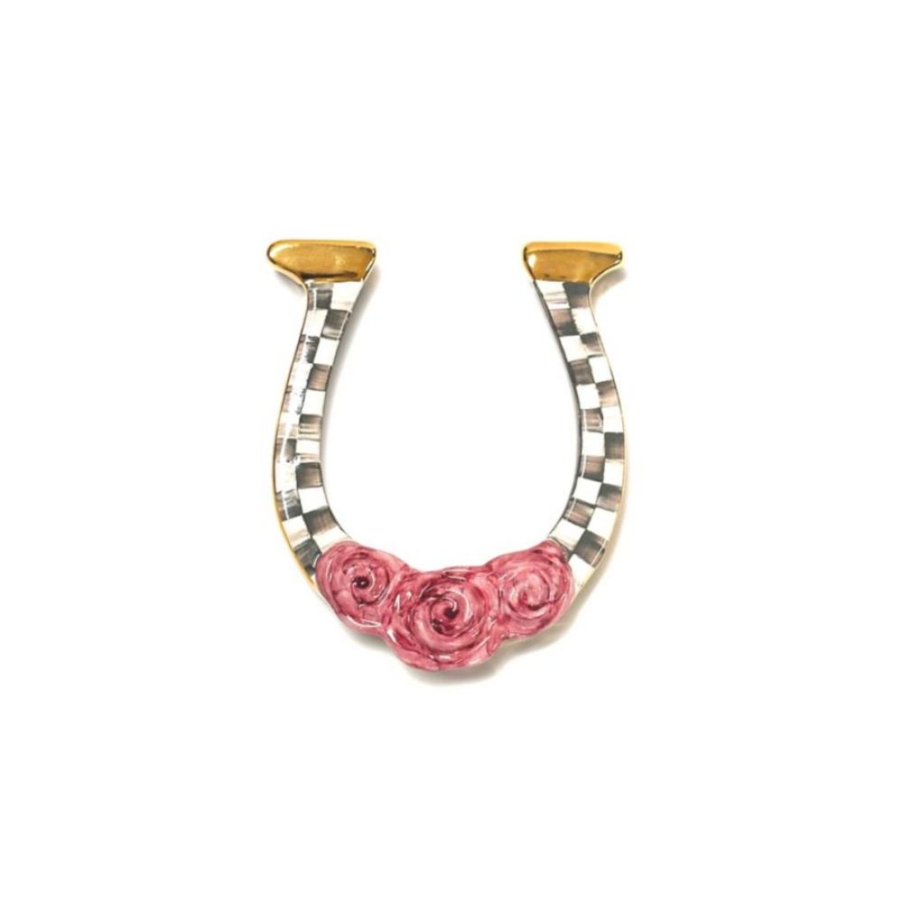 Mackenzie-Childs mocha check horse shoe with pink roses and gold accents on a white background