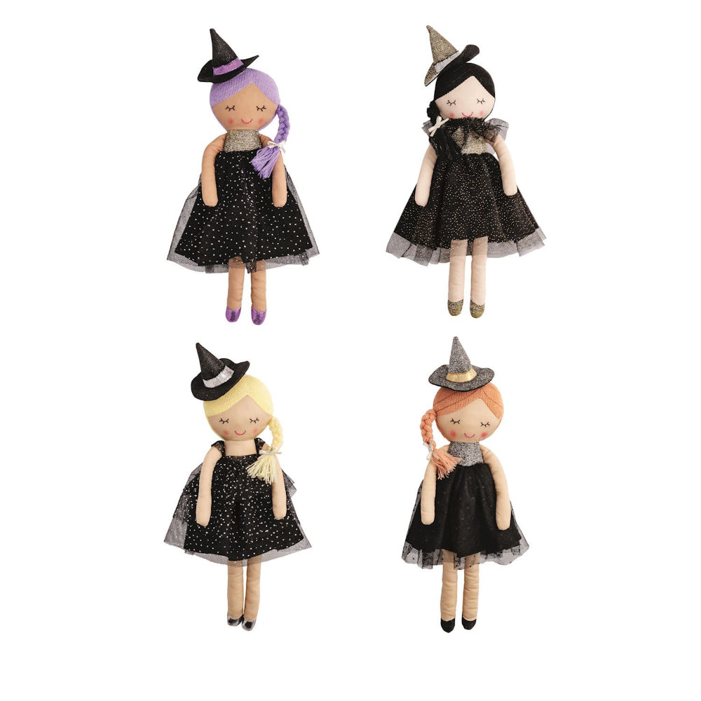 Four witch-themed dolls with purple, black, blonde and orange hair with black dresses and hat on a white background.
