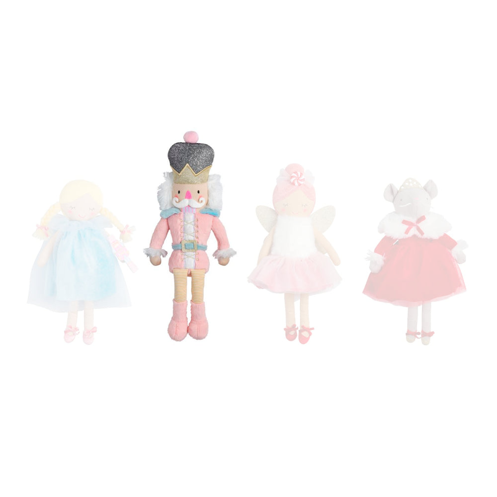 Pink nutcracker holiday nutcracker ballet themed doll on a white background.