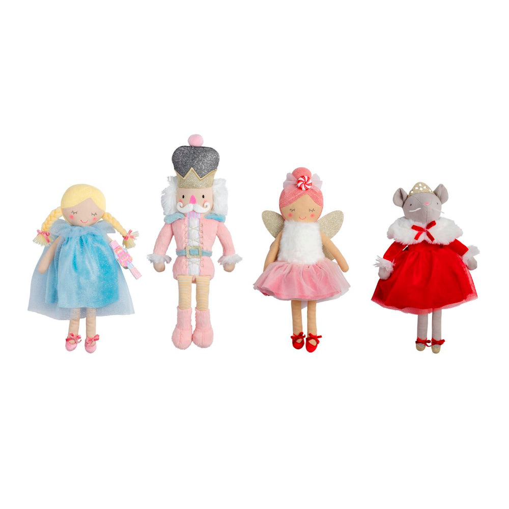 Four holiday nutcracker ballet themed dolls a on a white background.