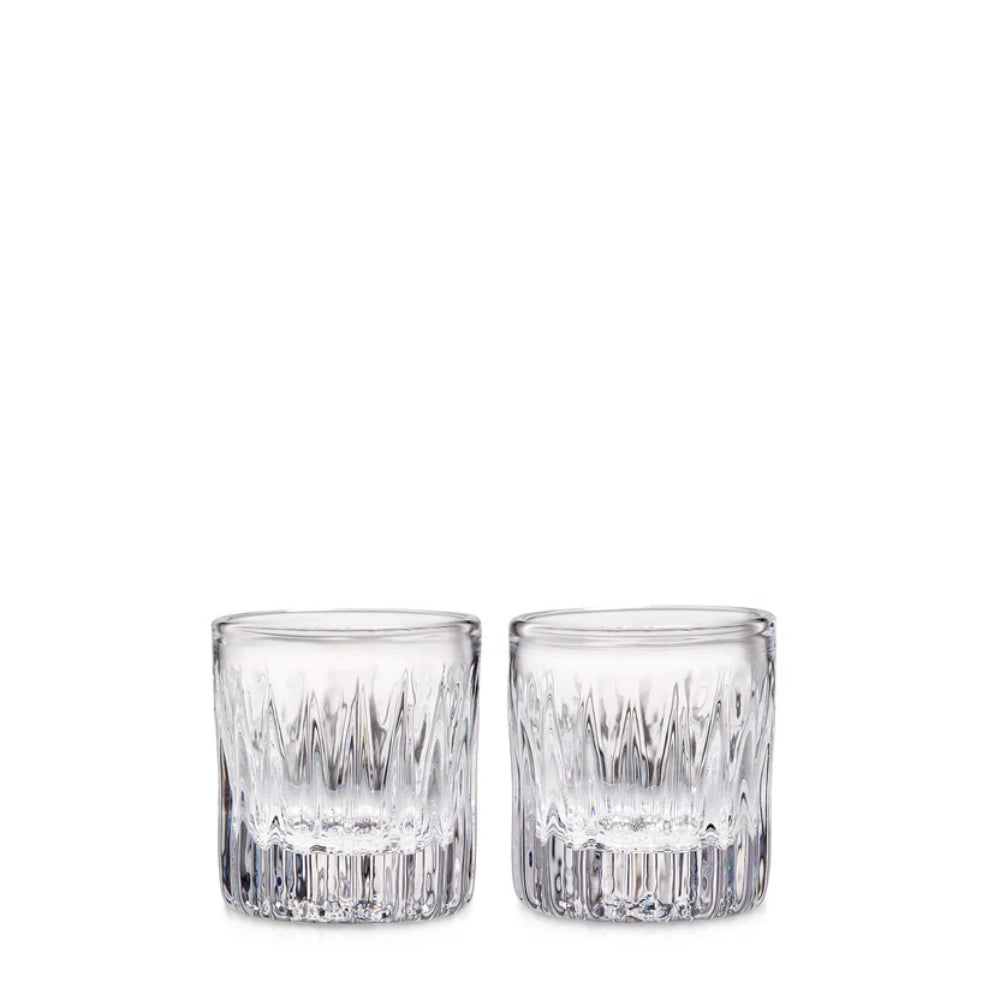 Two clear cut-crystal whiskey glasses with a textured diamond pattern, shown side-by-side on a white background.