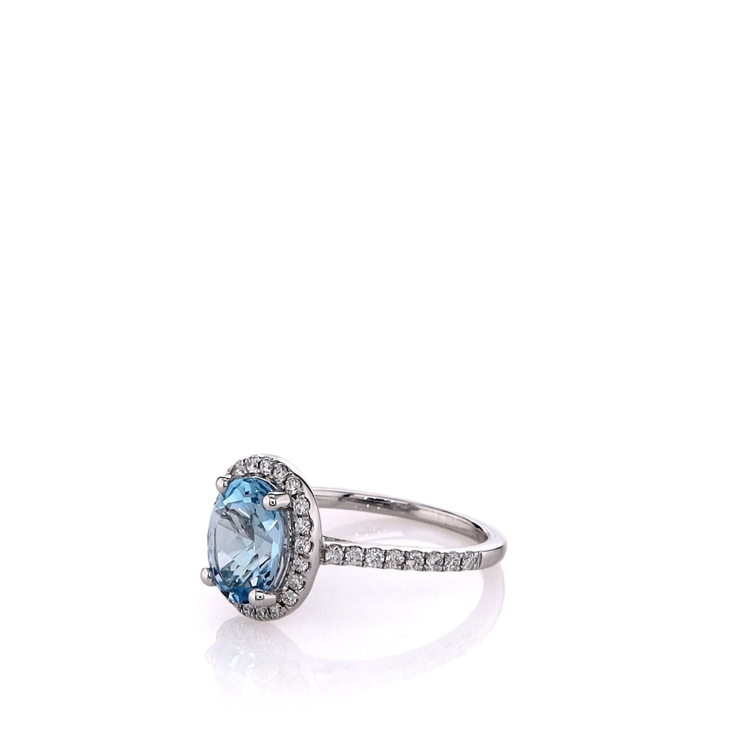 14k White Gold Oval Blue Topaz and Diamond Halo Ring