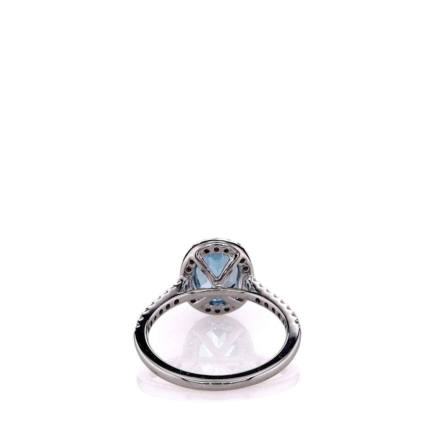 14k White Gold Oval Blue Topaz and Diamond Halo Ring