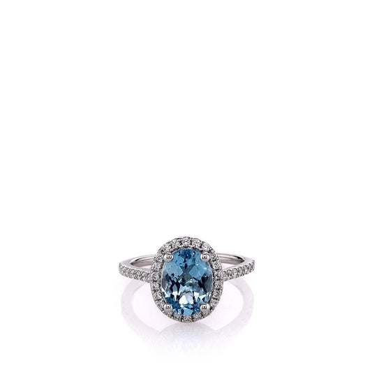 14k White Gold Oval Blue Topaz and Diamond Halo Ring