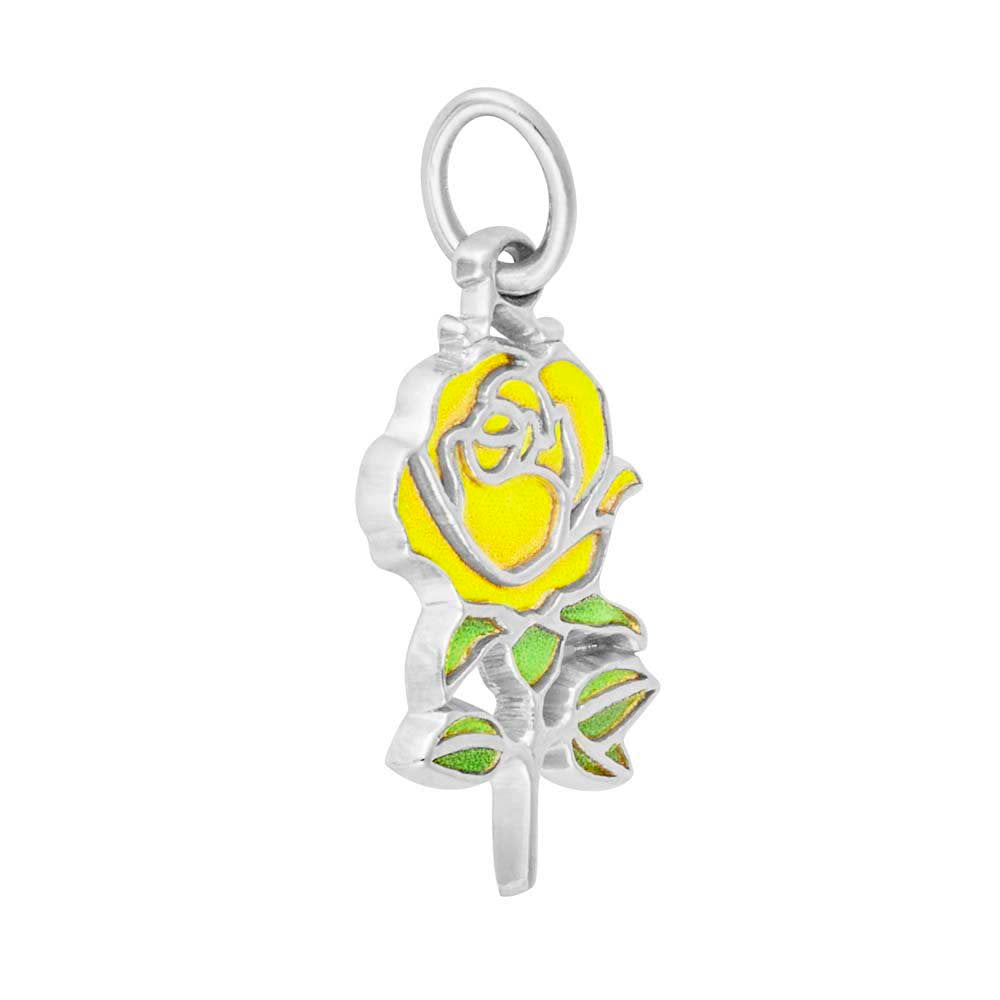 Angled view of a Silver Rose Charm painted yellow and green on a white background