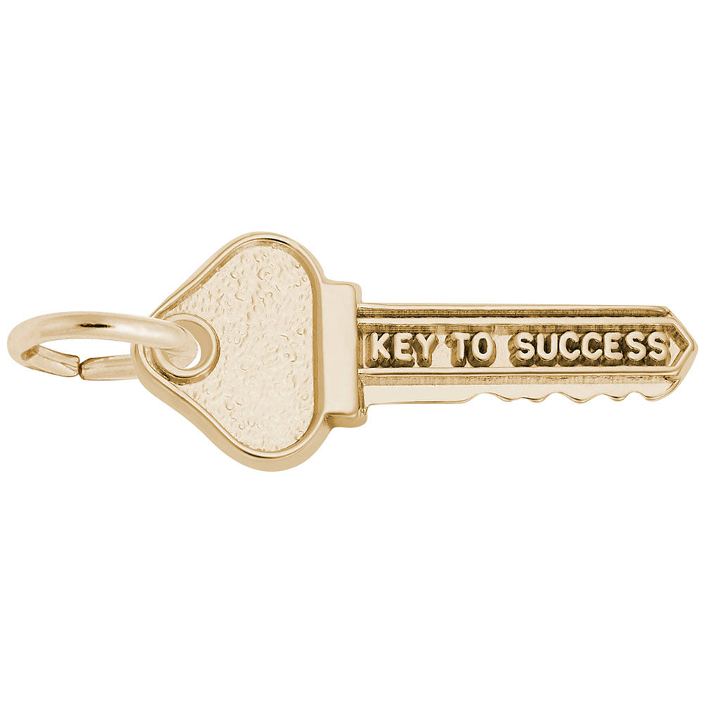 Gold key-shaped charm with 'Key to Success' text on a white background