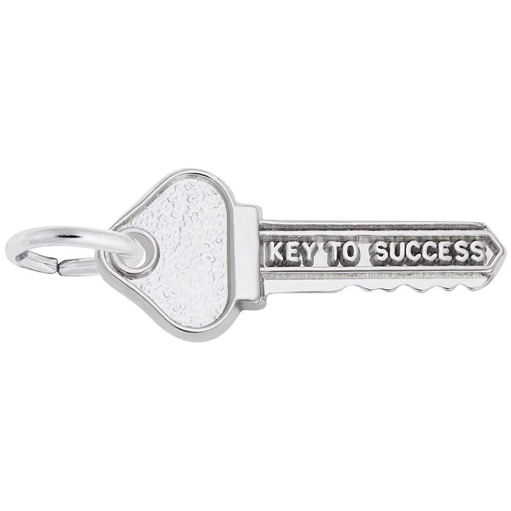 Silver key-shaped charm with 'Key to Success' text on a white background