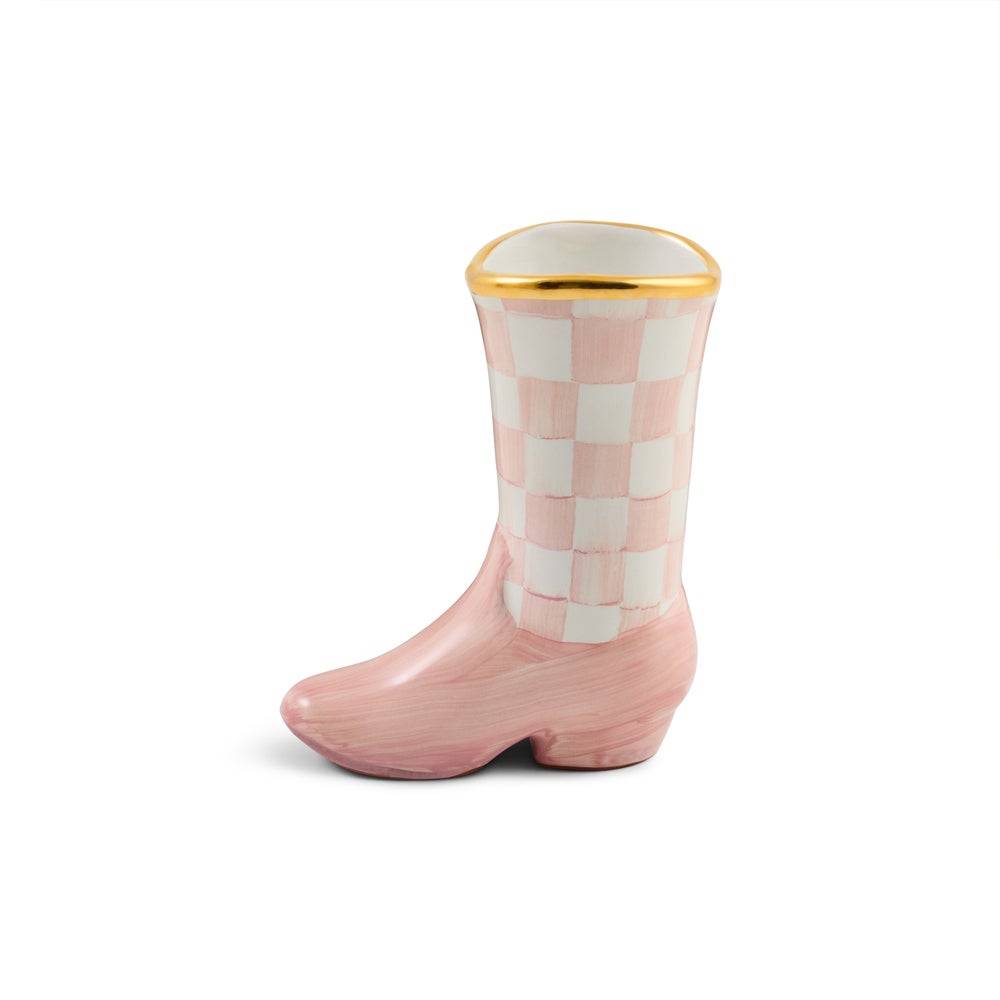 A pink and white checkered cowboy boot planter with a glossy finish and a gold rim, set against a plain white background.