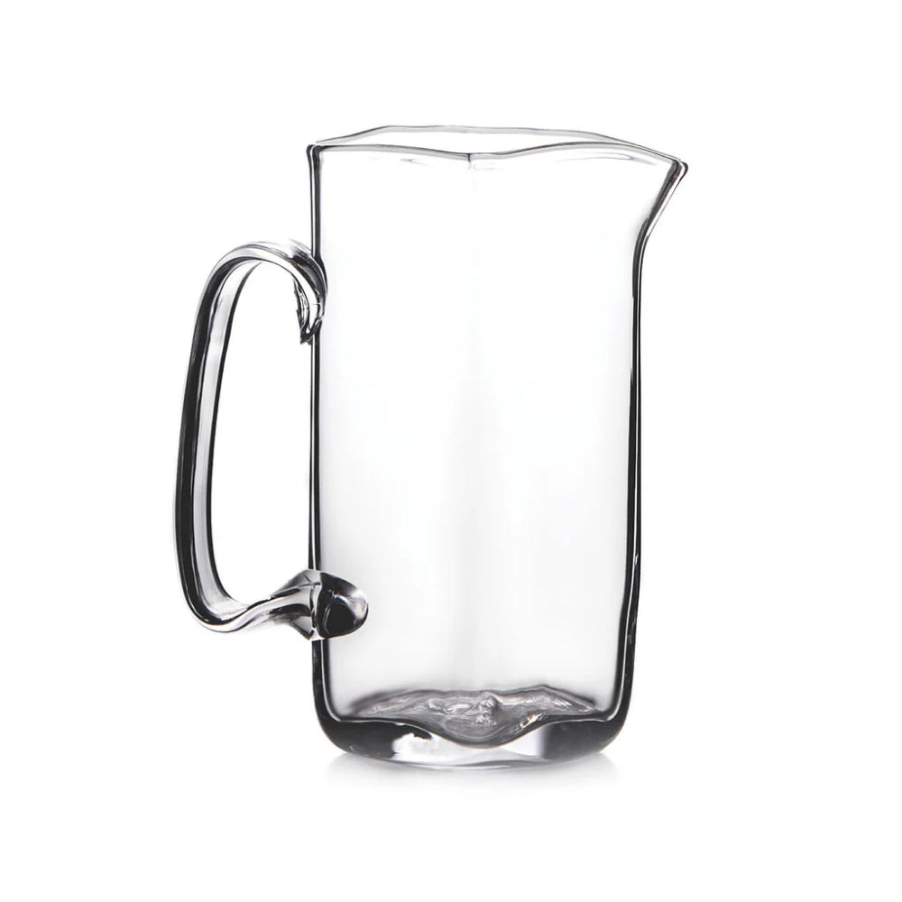 Medium glass pitcher on white background