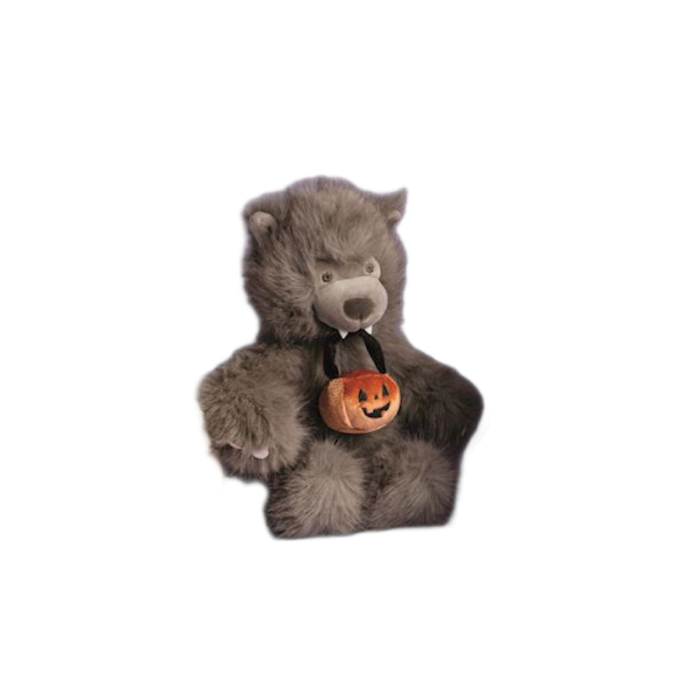 A brown werewolf with a stitched face, holding a small orange jack-o'-lantern bucket, isolated on a white background.