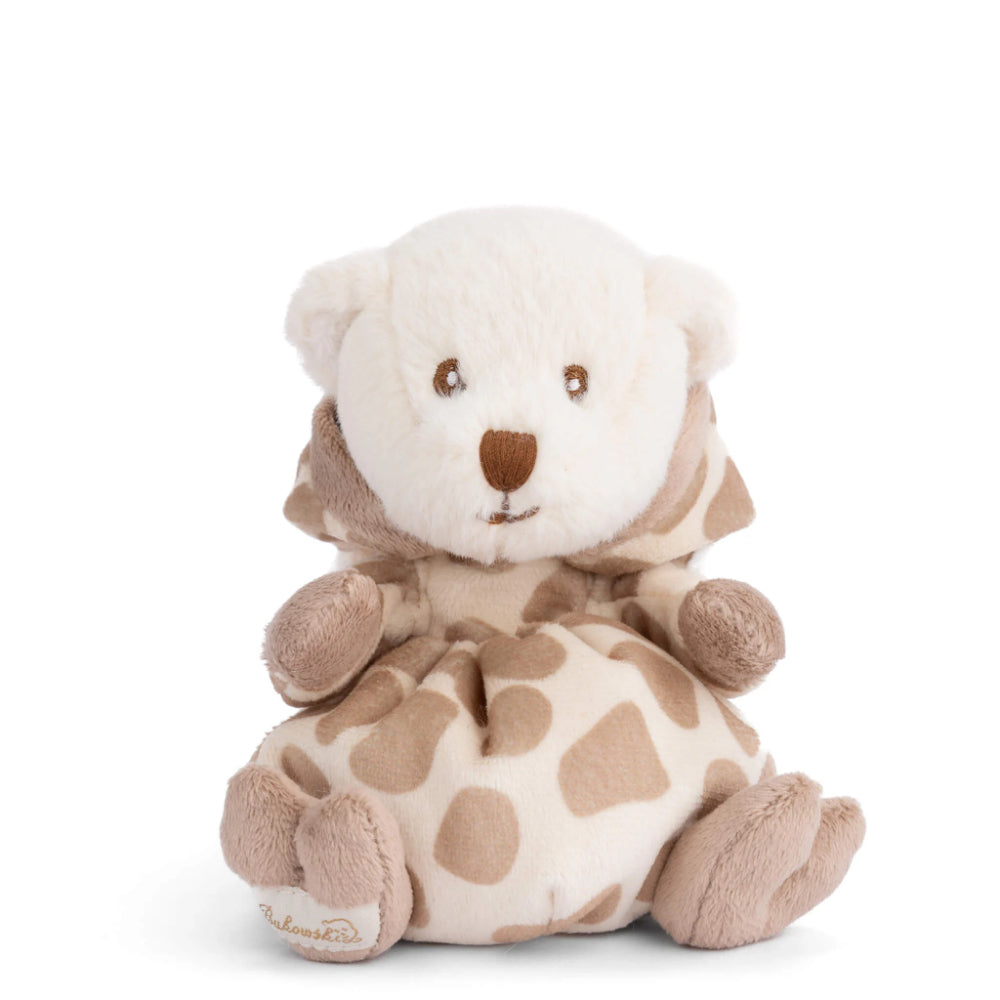 Teddy bear dressed in a giraffe robe with a hood on in a white and brown pattern not wearing the hood on a white background.