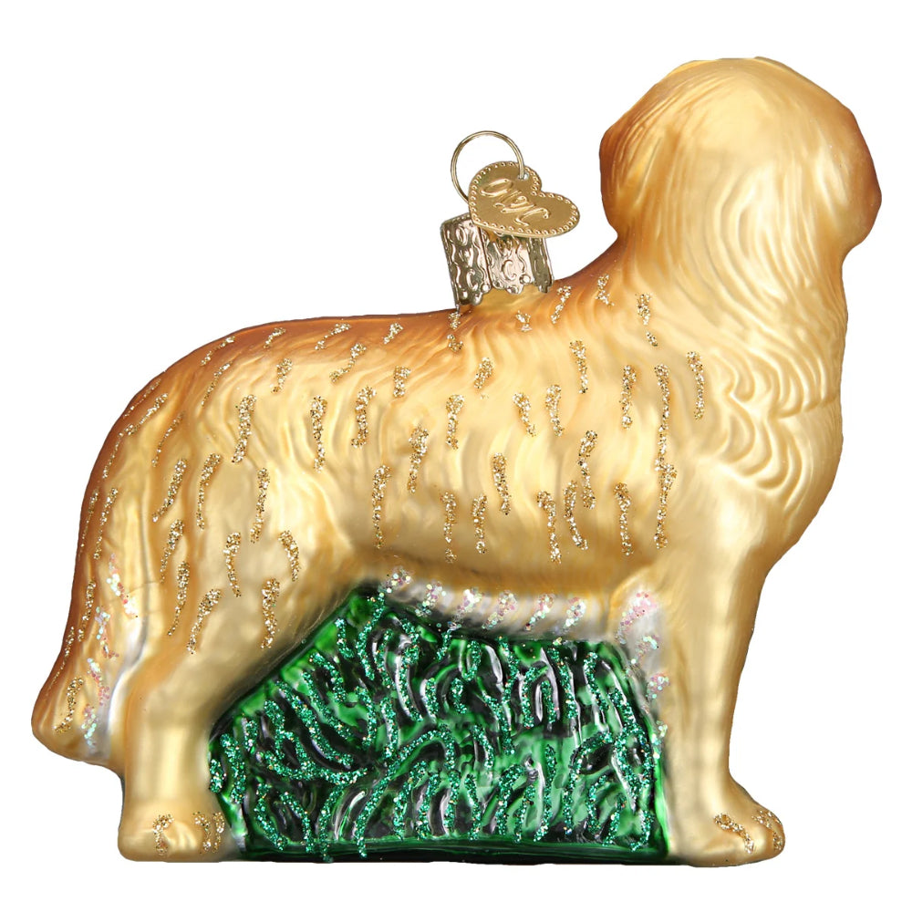 The back of a Golden Retriever christmas ornament on a white backround.
