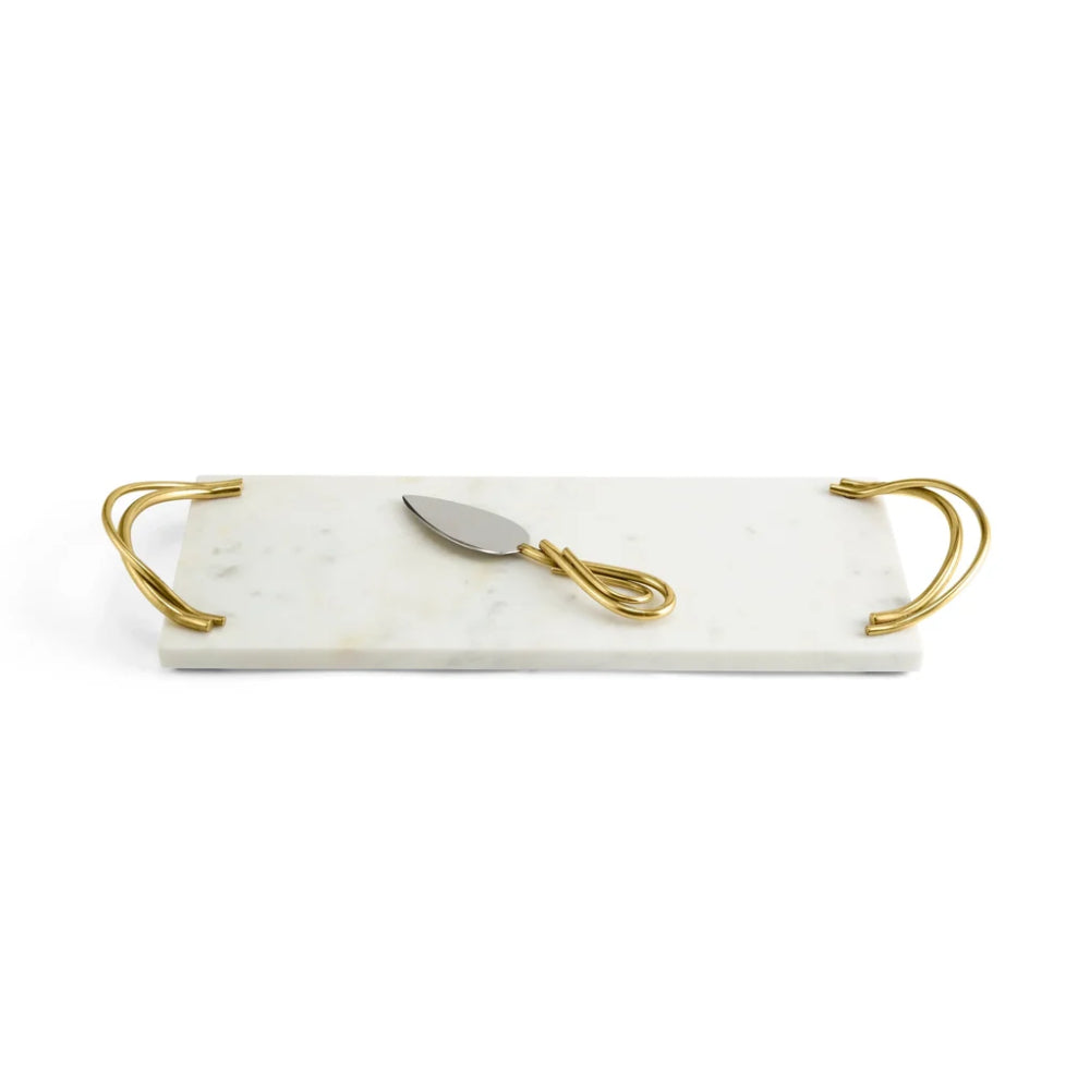 Marble tray with gold handles and a knife on a white background
