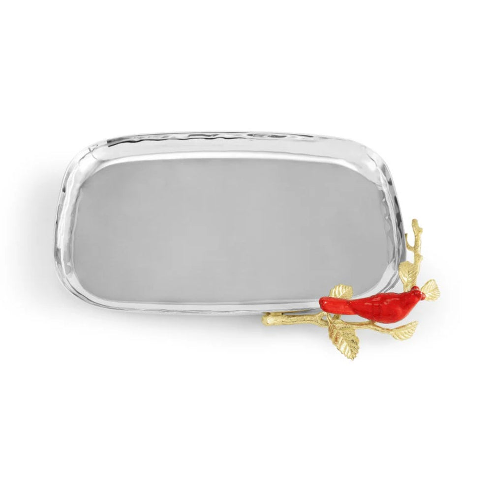 Decorative tray with a red and gold fish charm on a white background