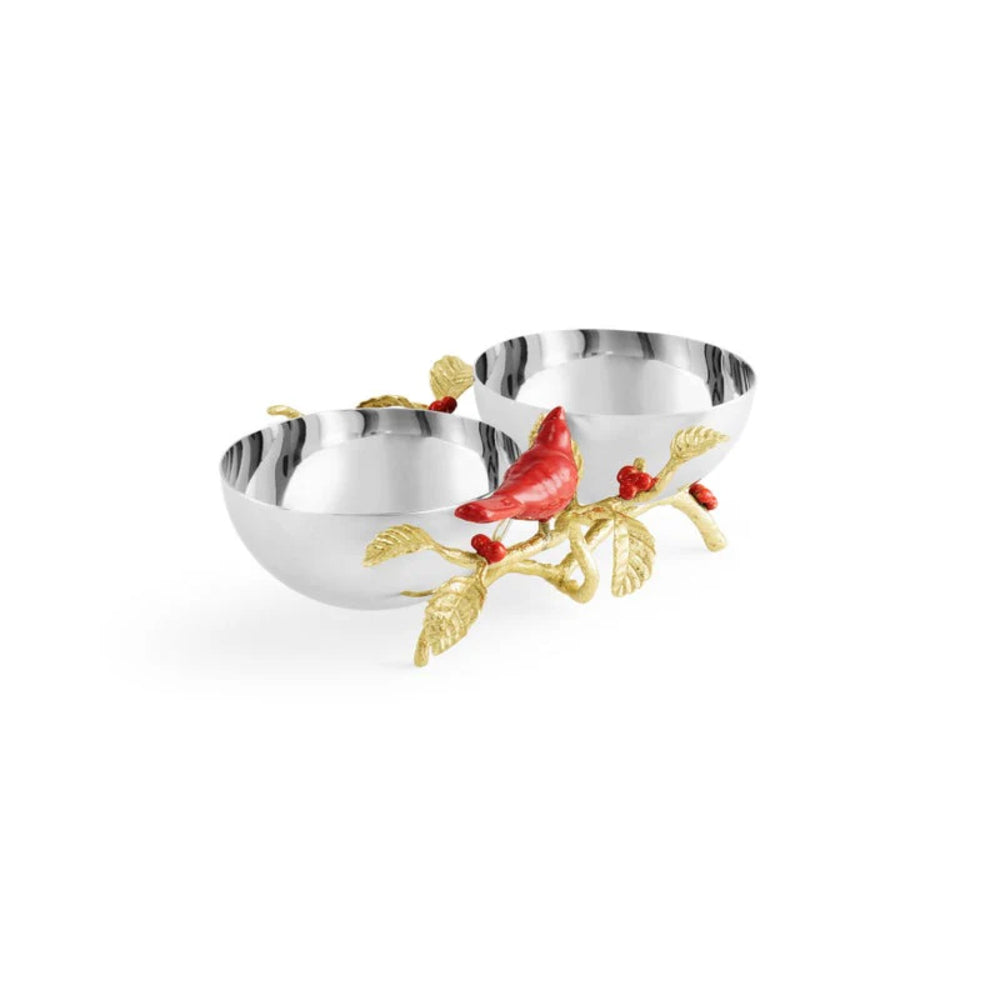 Decorative silver bowl with a red bird and gold branch on a white background