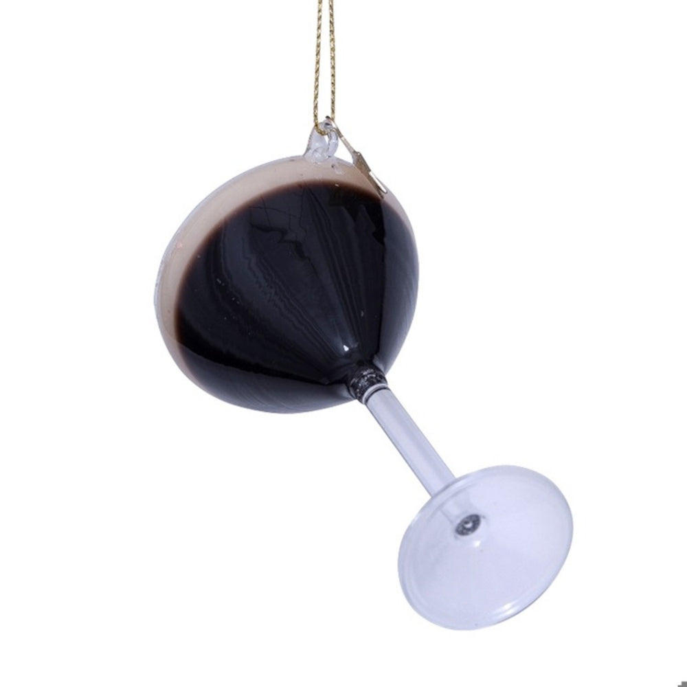 Decorative hanging martini glass with black and white design on a white background