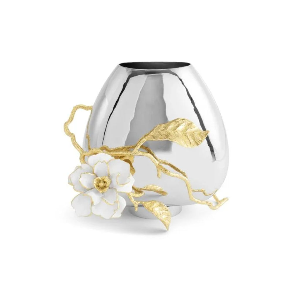 Silver vase with gold and white floral decorations on a white background