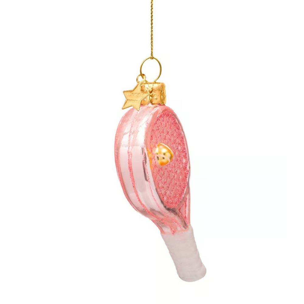 A pink and white tennis racket Christmas ornament with a gold hanging loop and star accent, shown against a plain white background.