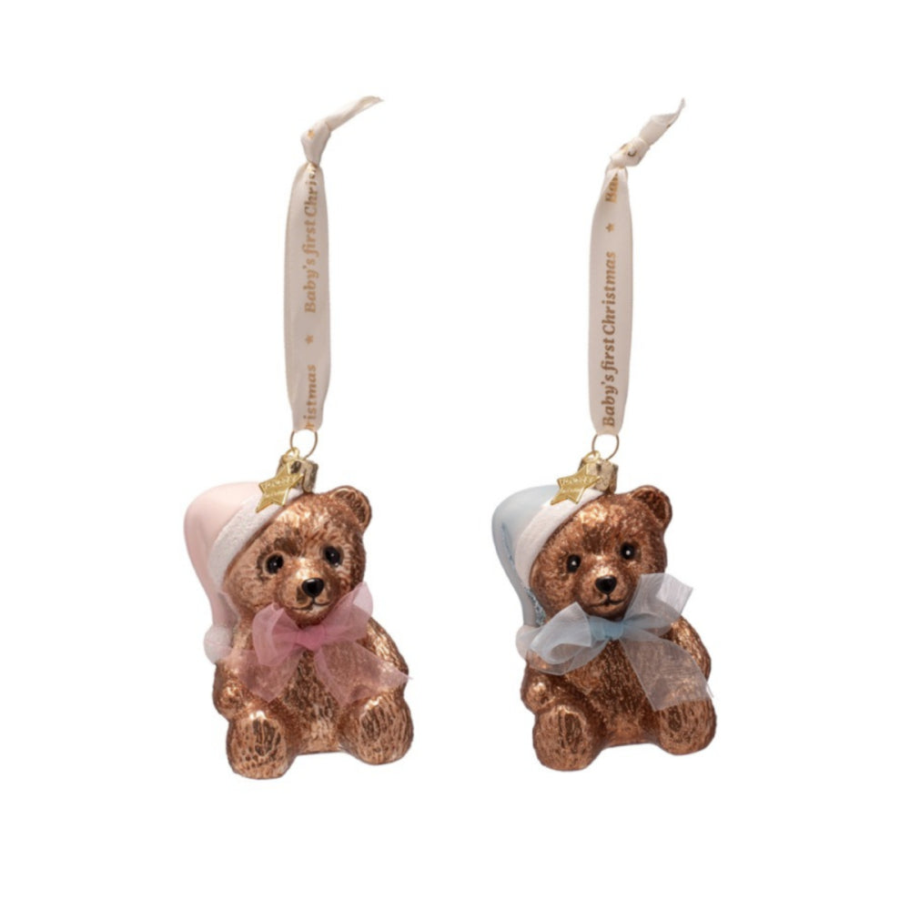 Two teddy bear ornaments with decorative ribbons on a white background