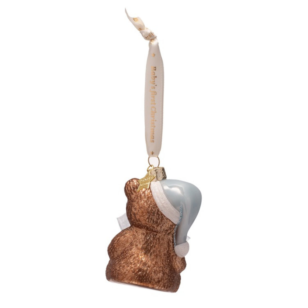 Decorative ornament of a bear with a ribbon on a white background