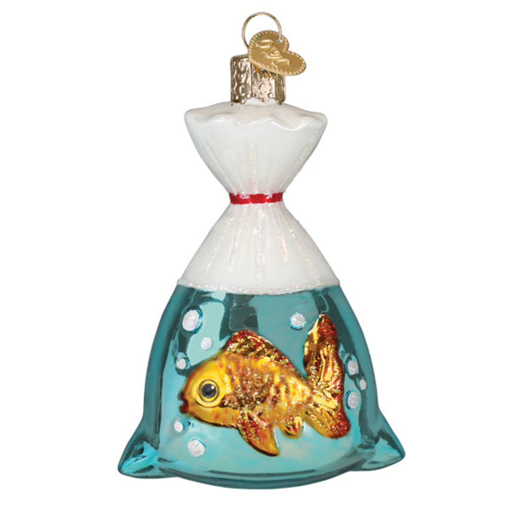 Decorative ornament of a goldfish in a plastic bag of water on a white background
