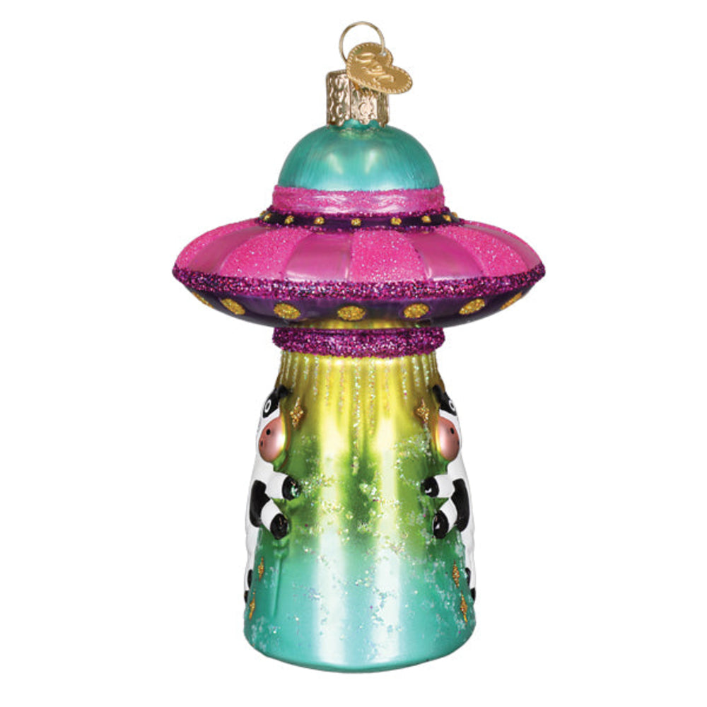 Colorful UFO ornament with alien design on a white background