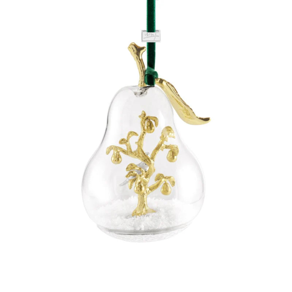 Decorative pear-shaped ornament with gold tree design on a white background.