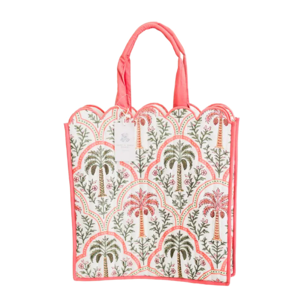 Heart of Grace quilted multi-color and pattern bag on a white background