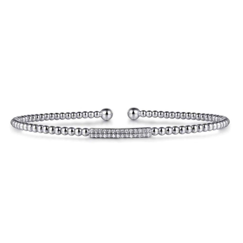Diamond ring with a pave design on a white background
