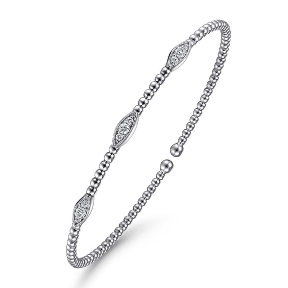 A silver-toned beaded bangle bracelet with three oval pavé-set stone accents, displayed on a clean white background.