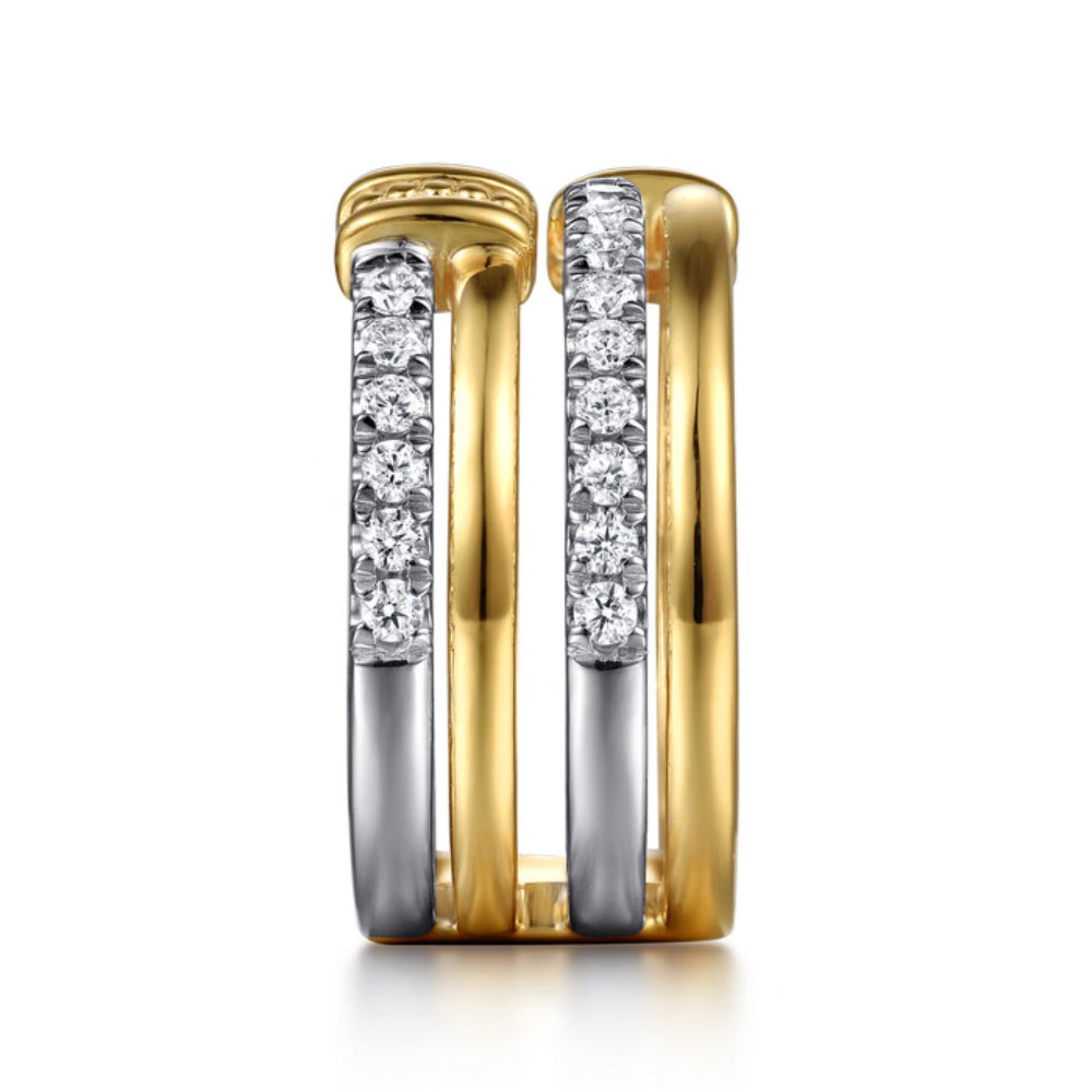 A two-tone yellow gold and silver huggie ring featuring rows of sparkling clear cubic zirconia stones on the front-facing band, set against a clean white background.