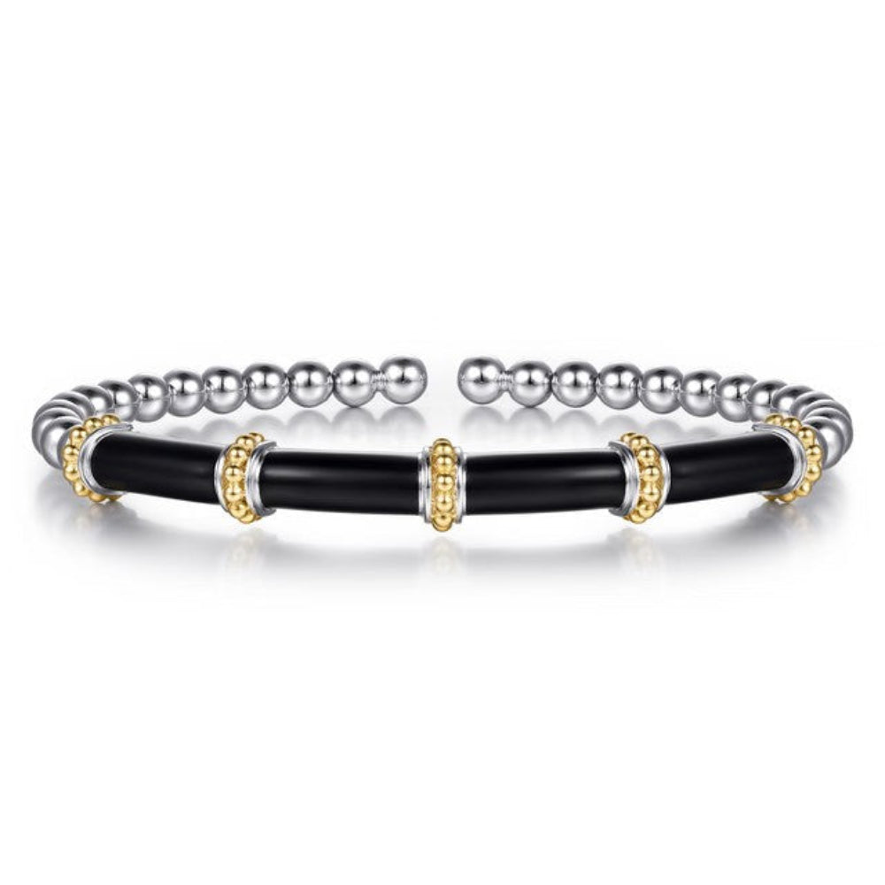 Silver and Gold cuff bangle bracelet with gold station and black enamel