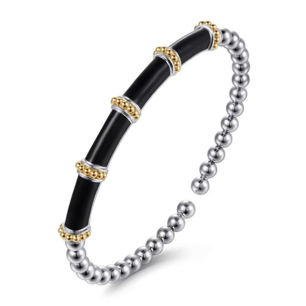 Bracelet with black, gold, and silver beads 