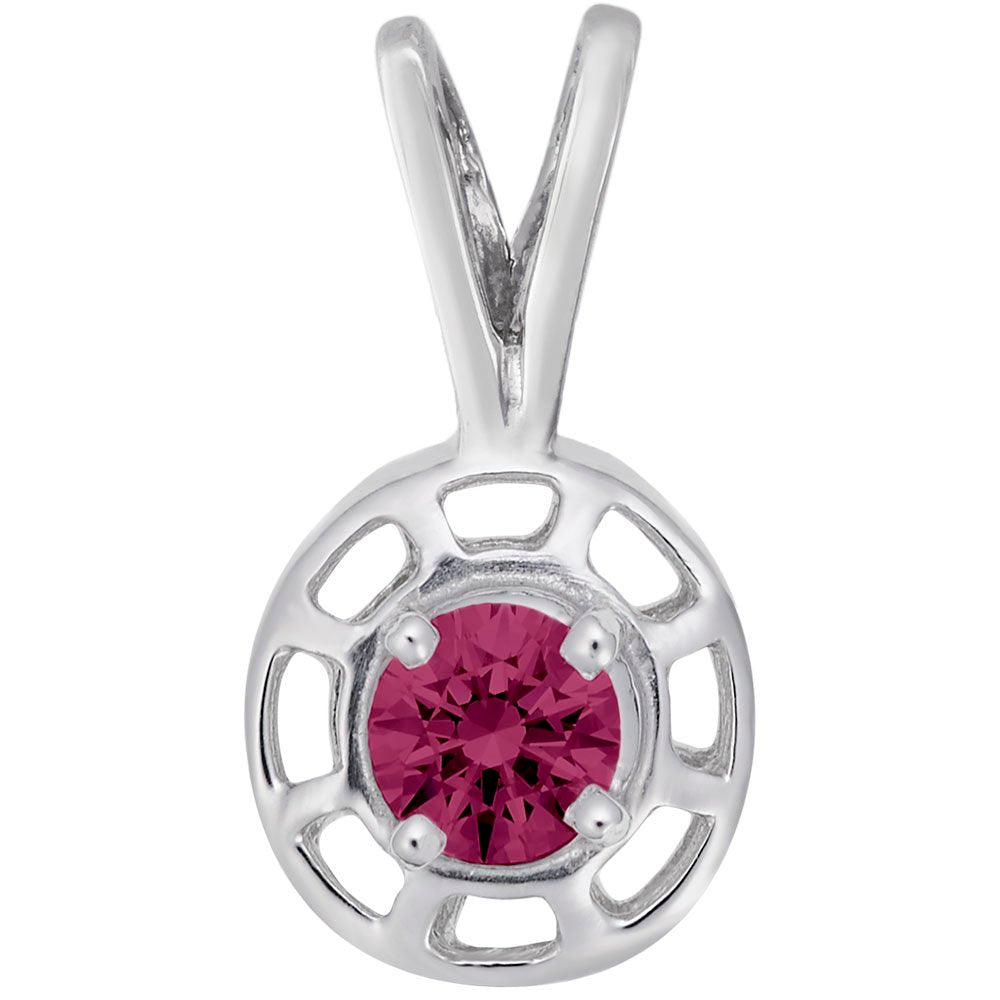 Round silver pendent with a red gemstone on a white background 